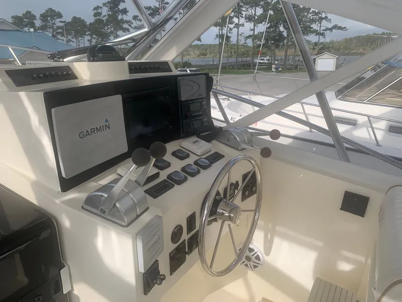 Slide: The Image of 2003 Carolina Classic Express helm with Garmin navigation system. - 20