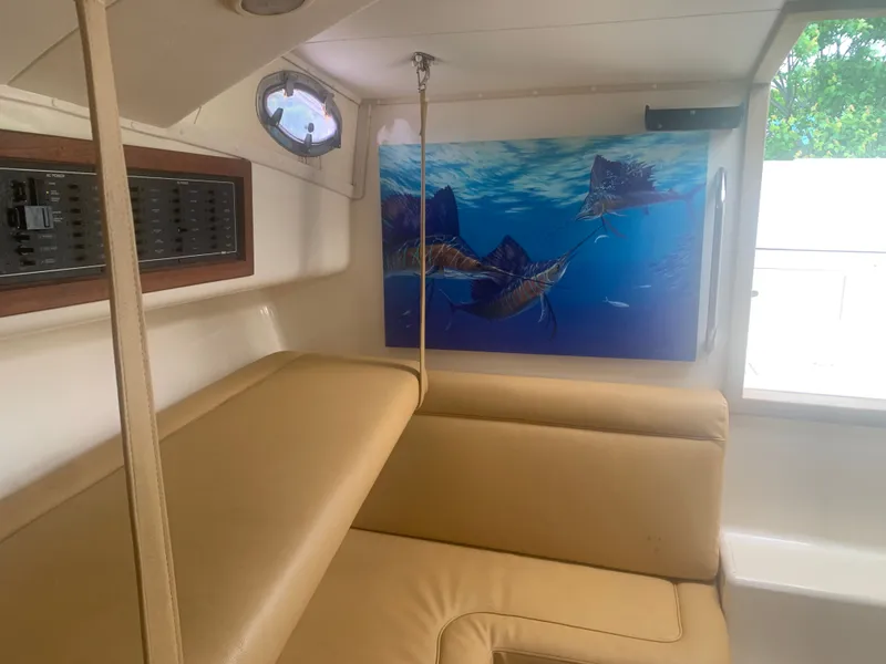 Slide: The Image of Interior of a 2003 Carolina Classic Express with fish painting. - 39