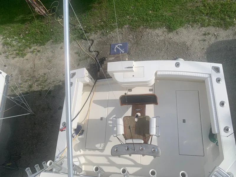 Slide: The Image of Aerial view of a 2003 Carolina Classic Express boat deck. - 46