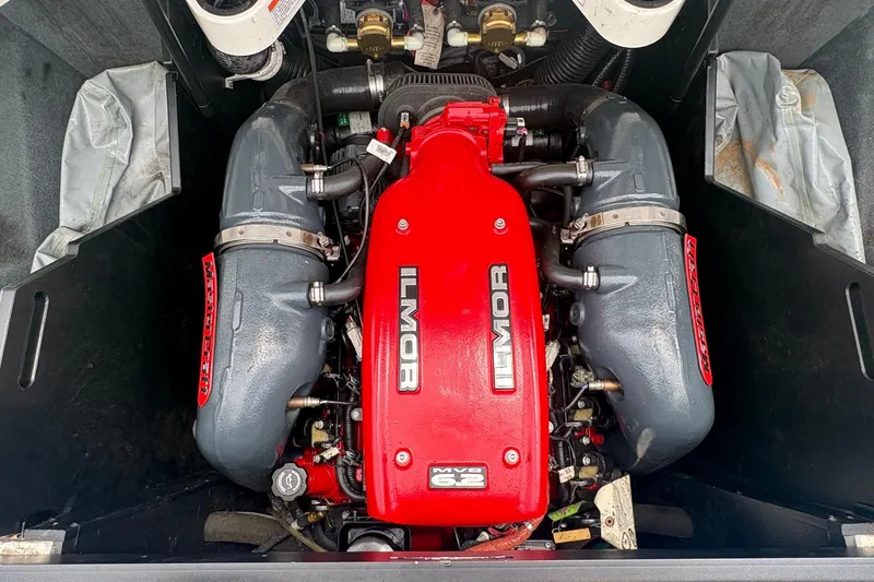 Slide: The Image of 2016 MasterCraft X26 Ilmor MV8 6.2 engine in boat compartment. - 12