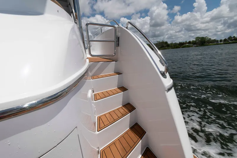 Slide: The Image of Staircase on 2009 Hatteras 60 Motor Yacht with scenic water view. - 35