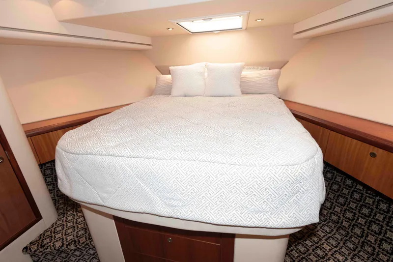 Slide: The Image of Luxurious bedroom interior of 2009 Hatteras 60 Motor Yacht with elegant bedding. - 69
