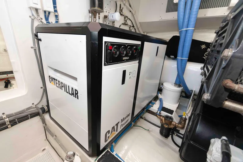 Slide: The Image of Engine room of 2009 Hatteras 60 Motor Yacht with Caterpillar marine generator. - 81