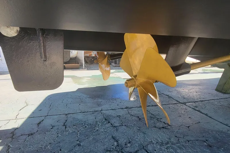 Slide: The Image of Propeller and rudder of 2009 Hatteras 60 Motor Yacht on dry dock. - 84