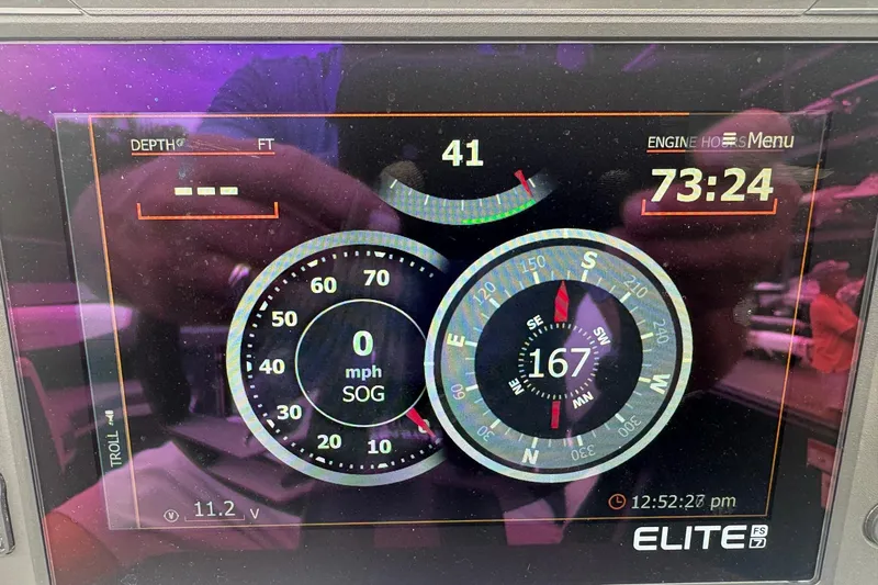 Slide: The Image of Digital dashboard of 2023 South Bay 525 RS 3.0 Arch boat displaying speed and navigation data. - 13
