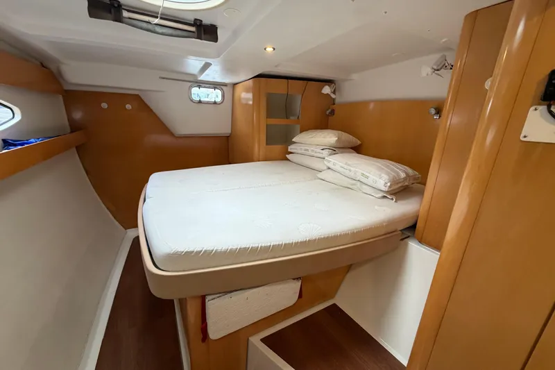 Slide: The Image of Cozy cabin interior of 2009 Fountaine Pajot Orana 44 catamaran with comfortable bed. - 27