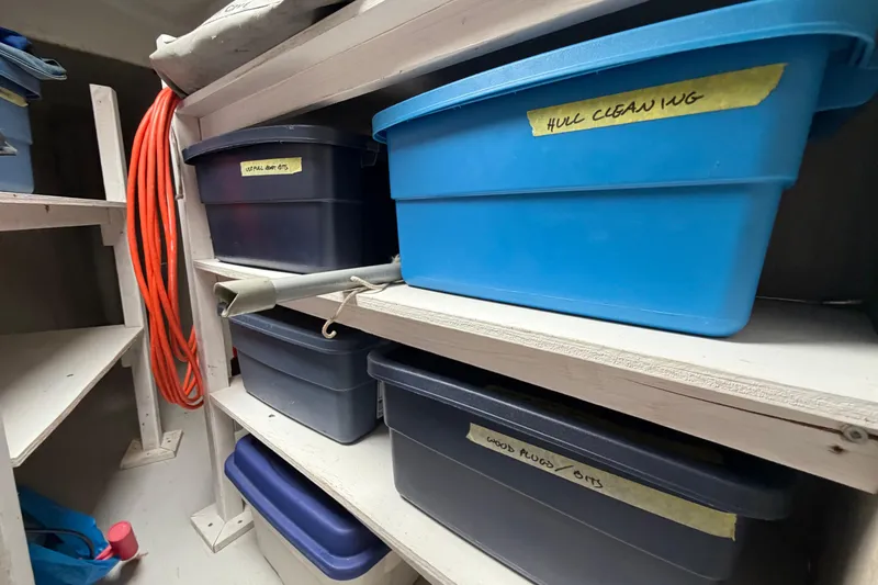 Slide: The Image of Storage area on a 2009 Fountaine Pajot Orana 44 with labeled bins and equipment. - 39