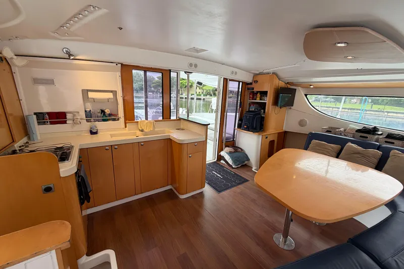Slide: The Image of Interior of 2009 Fountaine Pajot Orana 44 catamaran with modern kitchen and dining area. - 40