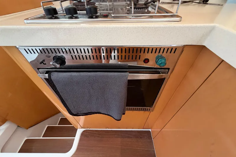 Slide: The Image of Galley kitchen in 2009 Fountaine Pajot Orana 44 catamaran with stove and oven. - 43
