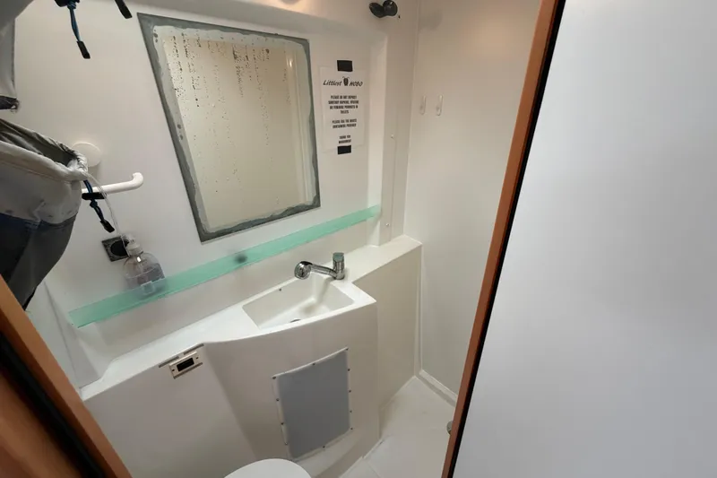 Slide: The Image of Bathroom interior of 2009 Fountaine Pajot Orana 44 catamaran with sink and mirror. - 46