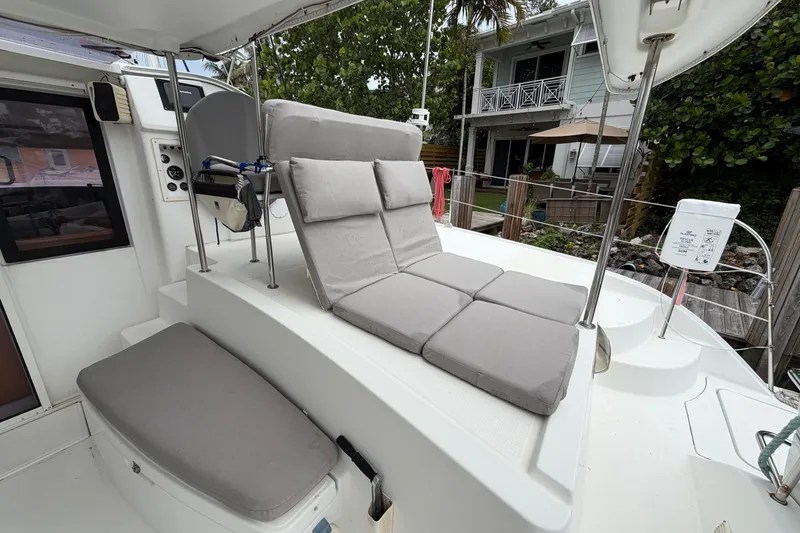 Slide: The Image of 2009 Fountaine Pajot Orana 44 catamaran with cushioned seating area on deck. - 55