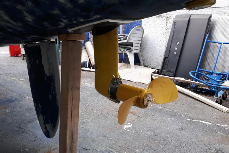 Slide: The Image of Yellow propeller of 2009 Fountaine Pajot Orana 44 catamaran in maintenance area. - 6