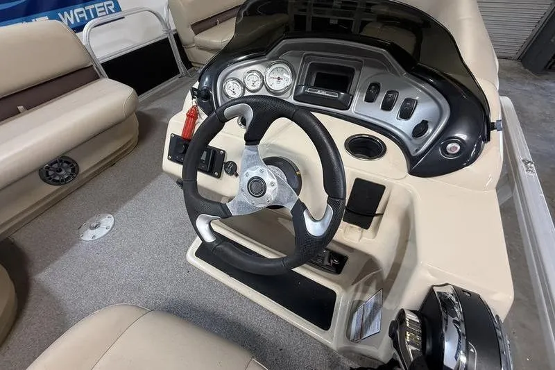 Slide: The Image of Steering console of a 2017 Sun Tracker Party Barge 22 DLX pontoon boat. - 9