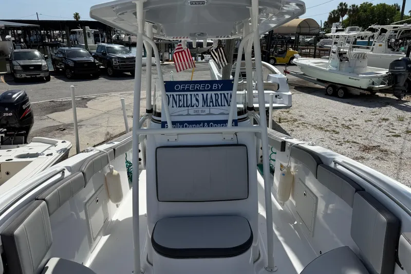 Slide: The Image of 2022 Aquasport 2300 Center Console boat at O'Neill's Marina, featuring spacious seating. - 6