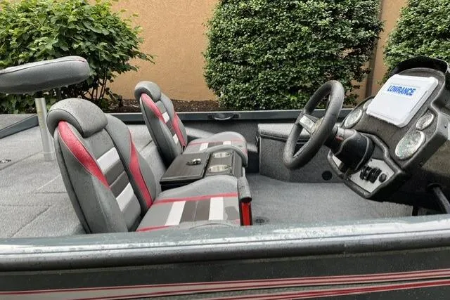 Slide: The Image of 2025 Ranger RT178 boat interior with dual seats and steering console. - 6