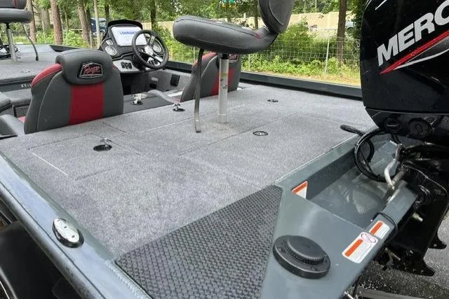 Slide: The Image of 2025 Ranger RT178 boat interior with Mercury engine, featuring seating and control panel. - 8