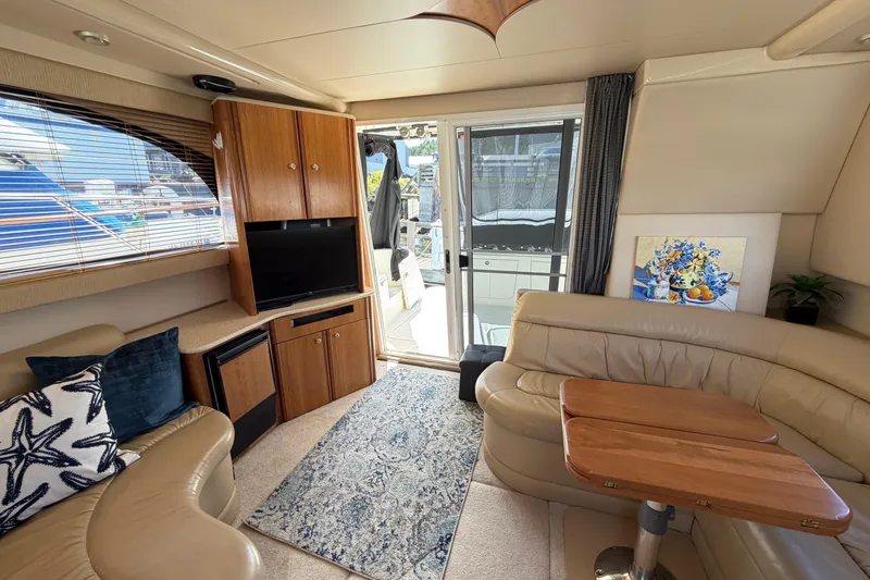 Slide: The Image of Luxurious interior of a 2004 Meridian 411 Sedan yacht with elegant seating and decor. - 2