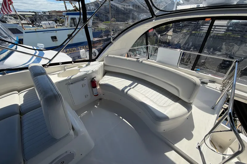 Slide: The Image of Luxurious 2004 Meridian 411 Sedan yacht interior with spacious seating and panoramic windows. - 33