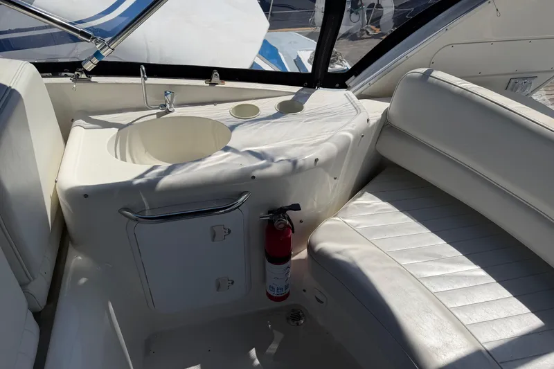 Slide: The Image of Interior of 2004 Meridian 411 Sedan yacht with sink, seating, and fire extinguisher. - 34