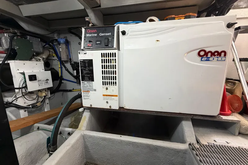 Slide: The Image of Engine room of 2004 Meridian 411 Sedan with Onan Marine Genset. - 41