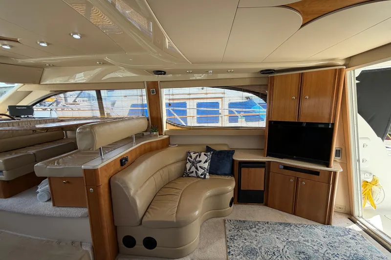 Slide: The Image of Luxurious interior of a 2004 Meridian 411 Sedan yacht with leather seating and modern amenities. - 7