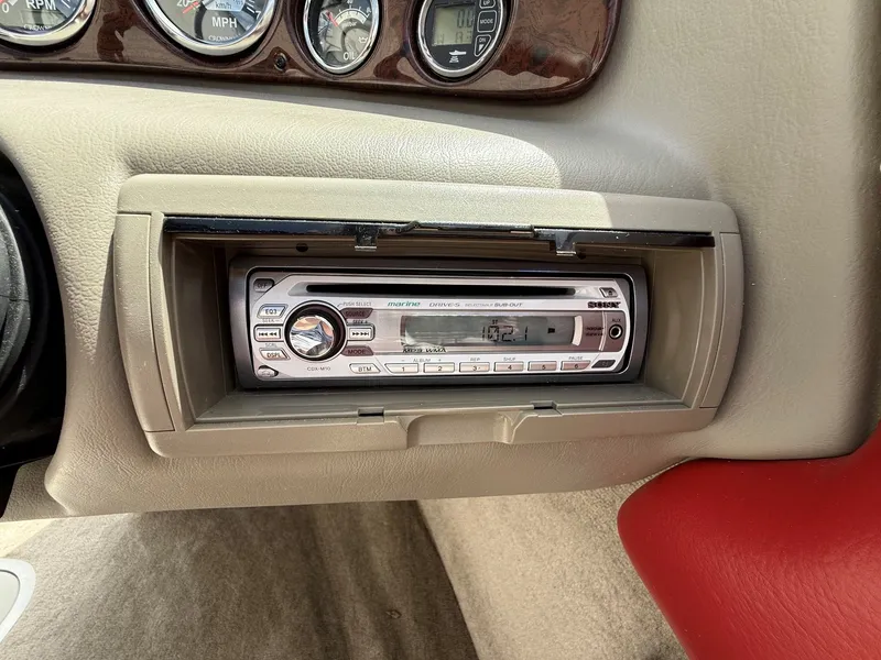 Slide: The Image of Crownline 180 BR 2010 dashboard featuring marine stereo system. - 17