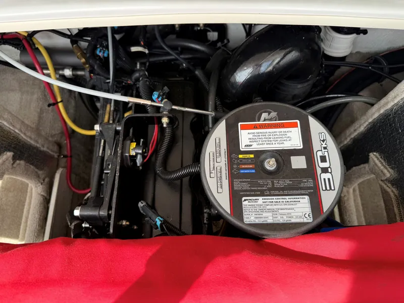 Slide: The Image of Engine compartment of a 2010 Crownline 180 BR boat with Mercury 3.0L engine. - 19
