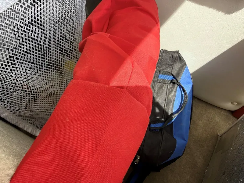 Slide: The Image of Red fabric and blue bag in Crownline 180 BR boat. - 20