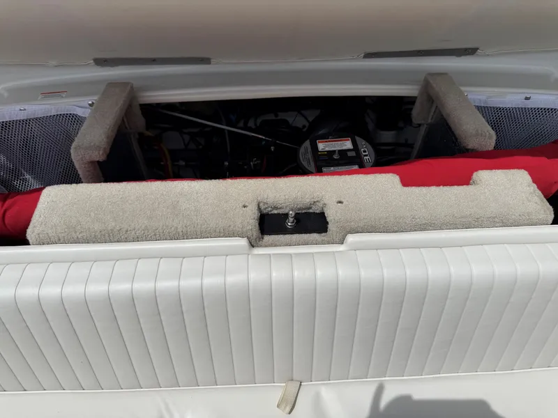 Slide: The Image of Engine compartment of a 2010 Crownline 180 BR boat. - 22