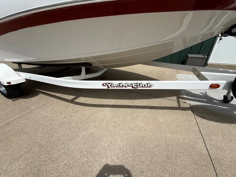 Slide: The Image of Crownline 180 BR 2010 on Yacht Club trailer. - 24