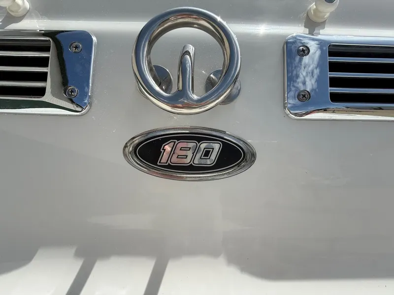 Slide: The Image of Crownline 180 BR boat emblem, 2010 model, close-up view. - 5
