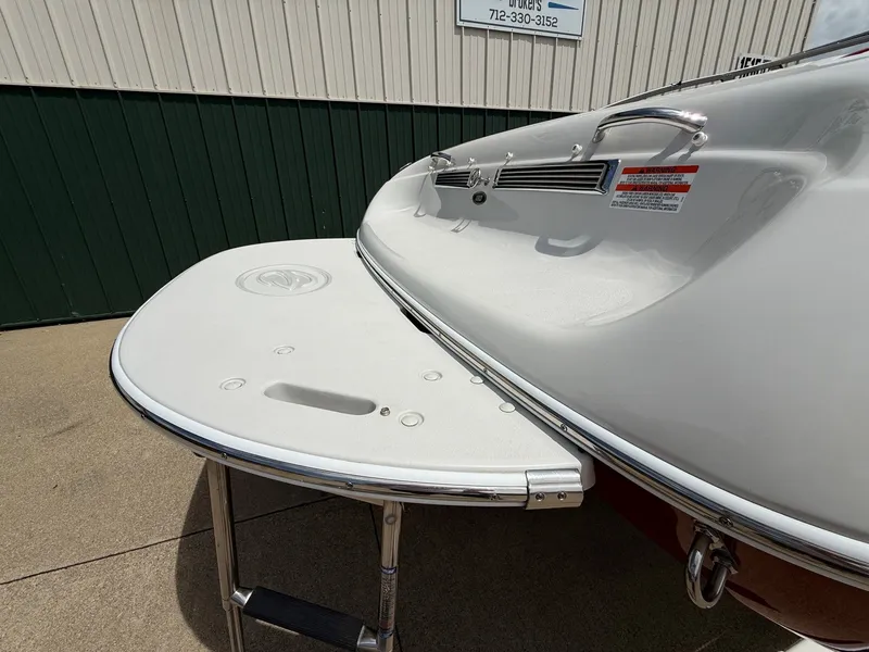 Slide: The Image of Crownline 180 BR 2010 boat with swim platform and ladder. - 7