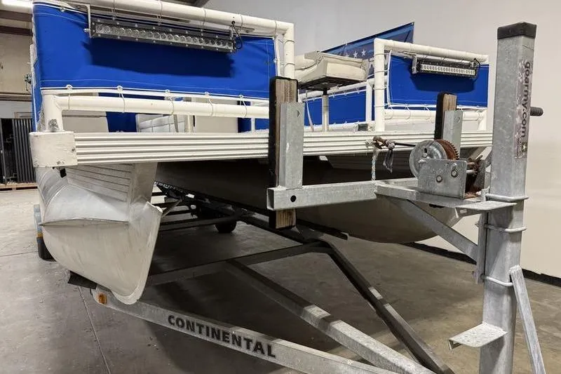 Slide: The Image of 1993 Monark Sun Caster 240 CR 4 Point pontoon boat on a Continental trailer. - 5