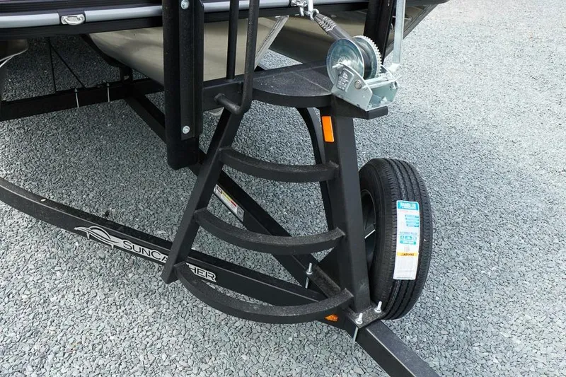 Slide: The Image of Trailer ladder and winch on 2026 SunCatcher Fusion 324RC boat trailer. - 13