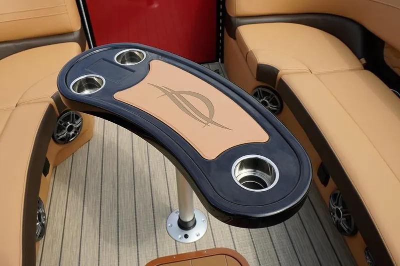 Slide: The Image of Luxurious seating area on 2026 SunCatcher Fusion 324RC boat with stylish table and cup holders. - 17