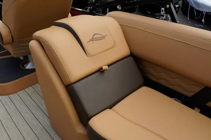 Slide: The Image of Luxurious tan seating in 2026 SunCatcher Fusion 324RC boat interior. - 32