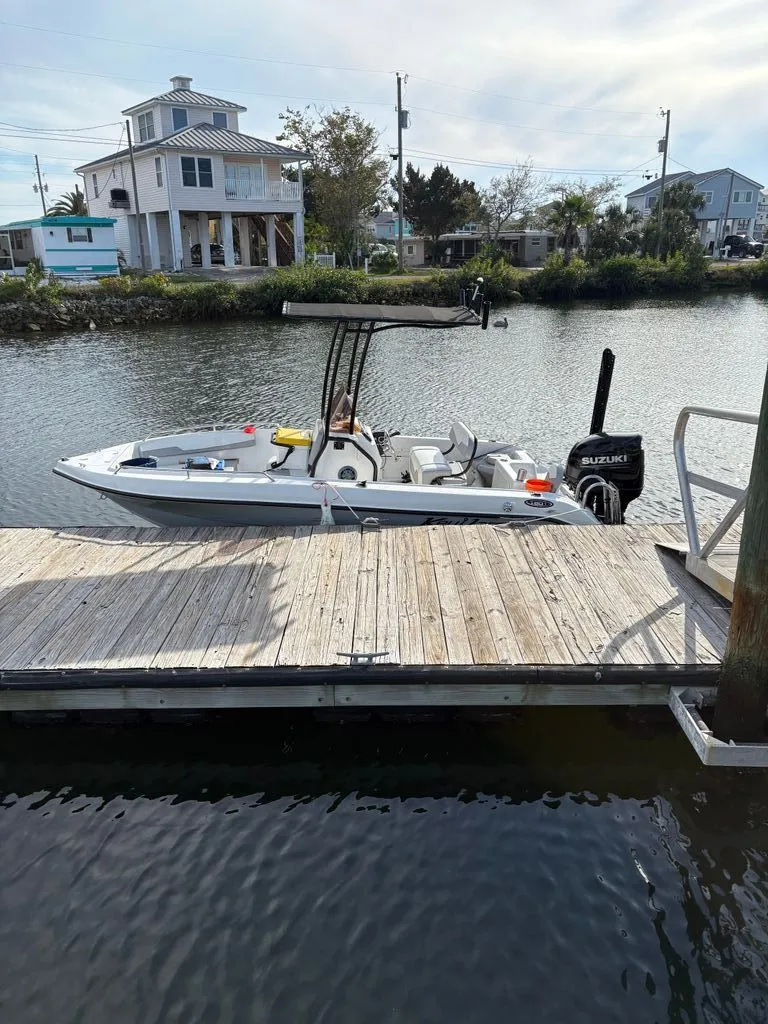 Slide: The Image of 2024 Caravelle Key Largo 1800 CC boat at dock. - 10