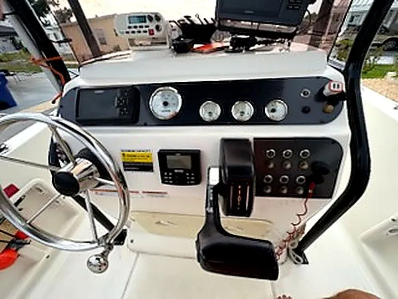 Slide: The Image of Dashboard of 2024 Caravelle Key Largo 1800 CC with steering and instruments. - 5