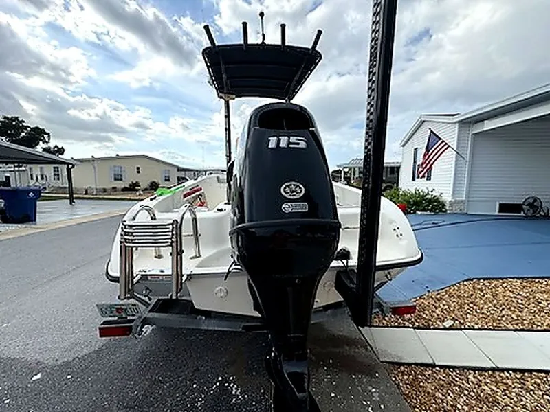 Slide: The Image of 2024 Caravelle Key Largo 1800 CC boat with outboard motor. - 9