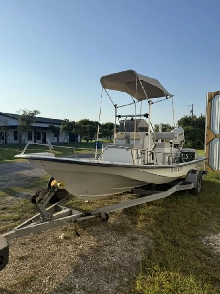 Slide: The Image of 1992 Gulf Coast GC20 boat on trailer outdoors. - 1