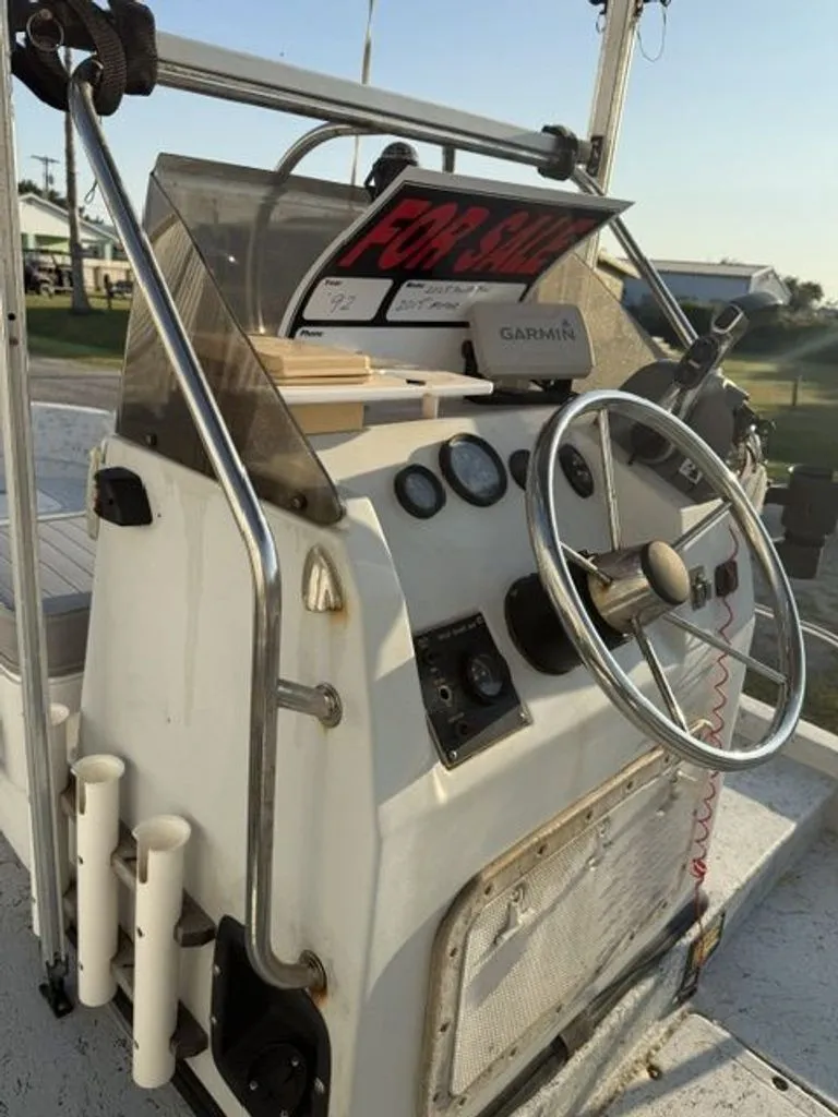 Slide: The Image of 1992 Gulf Coast GC20 boat console with for sale sign. - 4