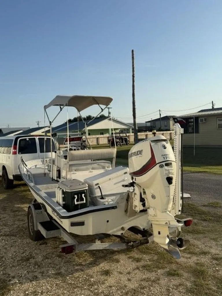 Slide: The Image of 1992 Gulf Coast GC20 boat with outboard motor on trailer. - 6