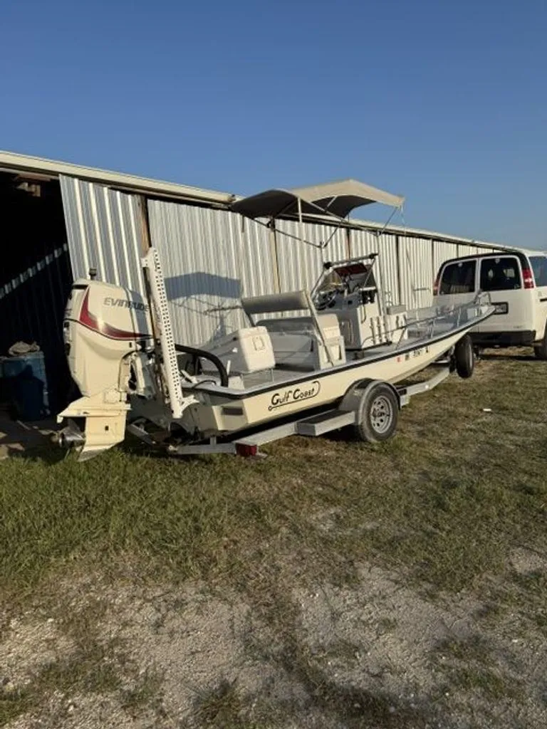 Slide: The Image of 1992 Gulf Coast GC20 boat on trailer beside warehouse. - 7