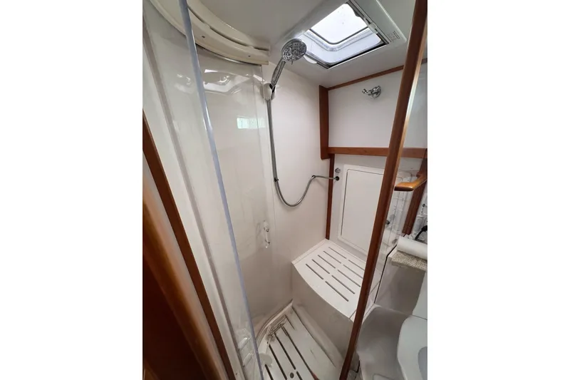 Slide: The Image of Shower area in 2006 Sabre 38 Salon Express yacht, featuring sleek design and modern fixtures. - 28