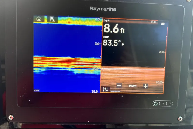 Slide: The Image of Raymarine sonar display showing 8.6 ft depth and 83.5°F water temperature. - 28