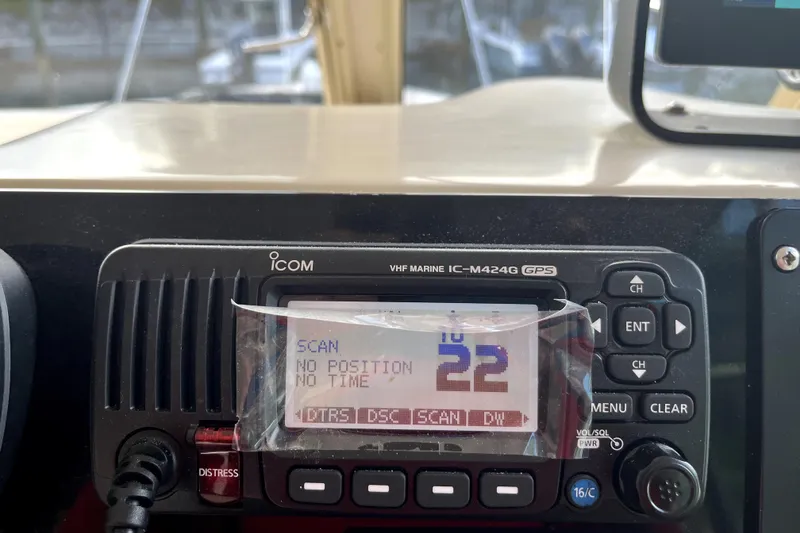 Slide: The Image of VHF marine radio on 2005 Albin 28 Tournament Express, displaying channel 22. - 30