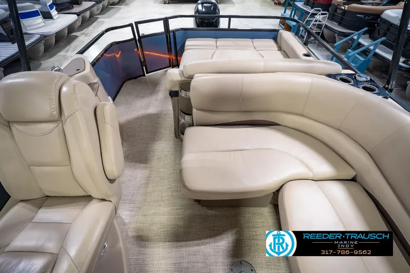 Slide: The Image of Luxurious interior of 2018 Regency 254 DL3 pontoon boat with beige seating. - 21