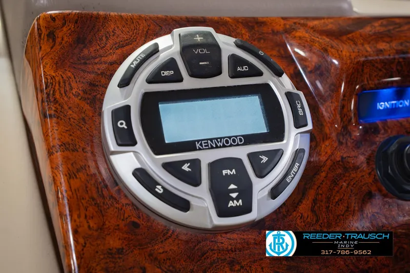 Slide: The Image of Kenwood audio control panel on 2018 Regency 254 DL3 boat dashboard. - 40