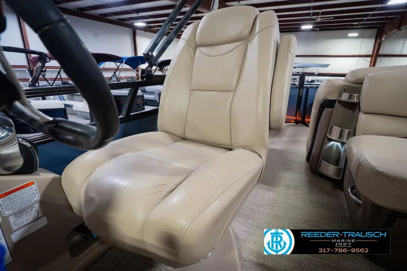 Slide: The Image of Luxurious beige seating in 2018 Regency 254 DL3 boat interior at Reeder-Trausch Marine. - 47