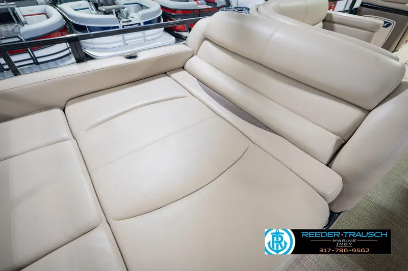 Slide: The Image of Luxurious beige seating on 2018 Regency 254 DL3 pontoon boat interior. - 48